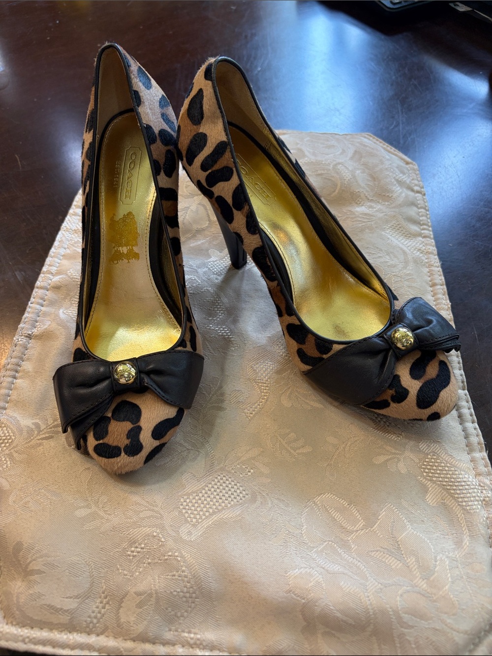 Coach Leopard-Print Bow Pumps in Tan and Black